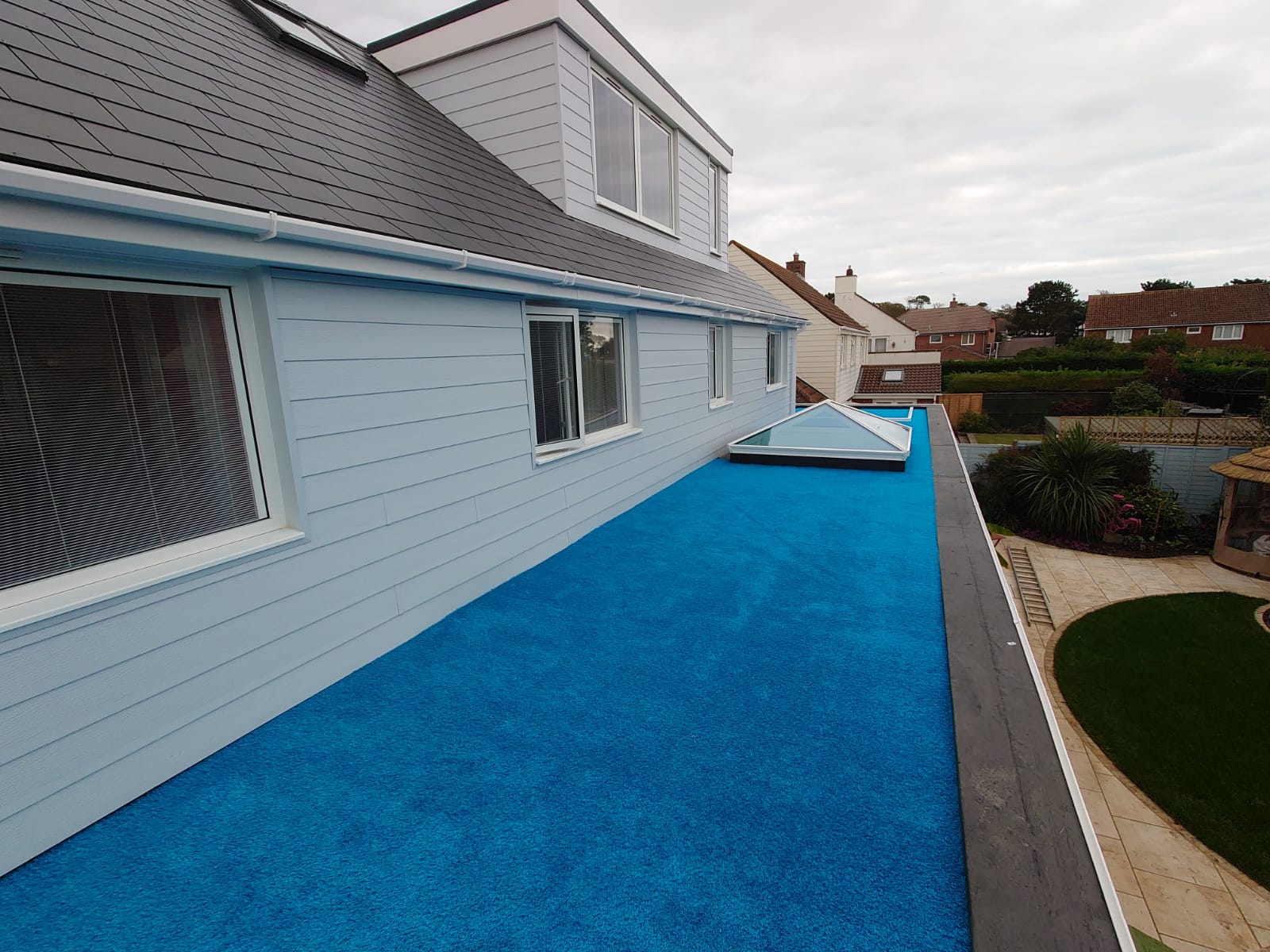 All Aspect Flooring; Case Study: Artificial Grass Installation on a Flat Roof in Mudeford